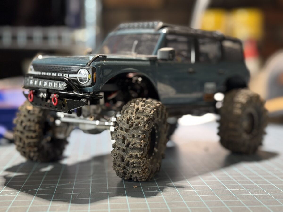 TRX4m Bronco in Area 51 teal-grey with aftermarket front bumper